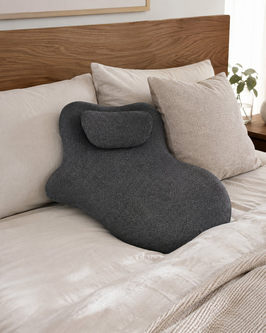 Pomence Couples Comfort Pillow blended in among regular bedroom pillows
