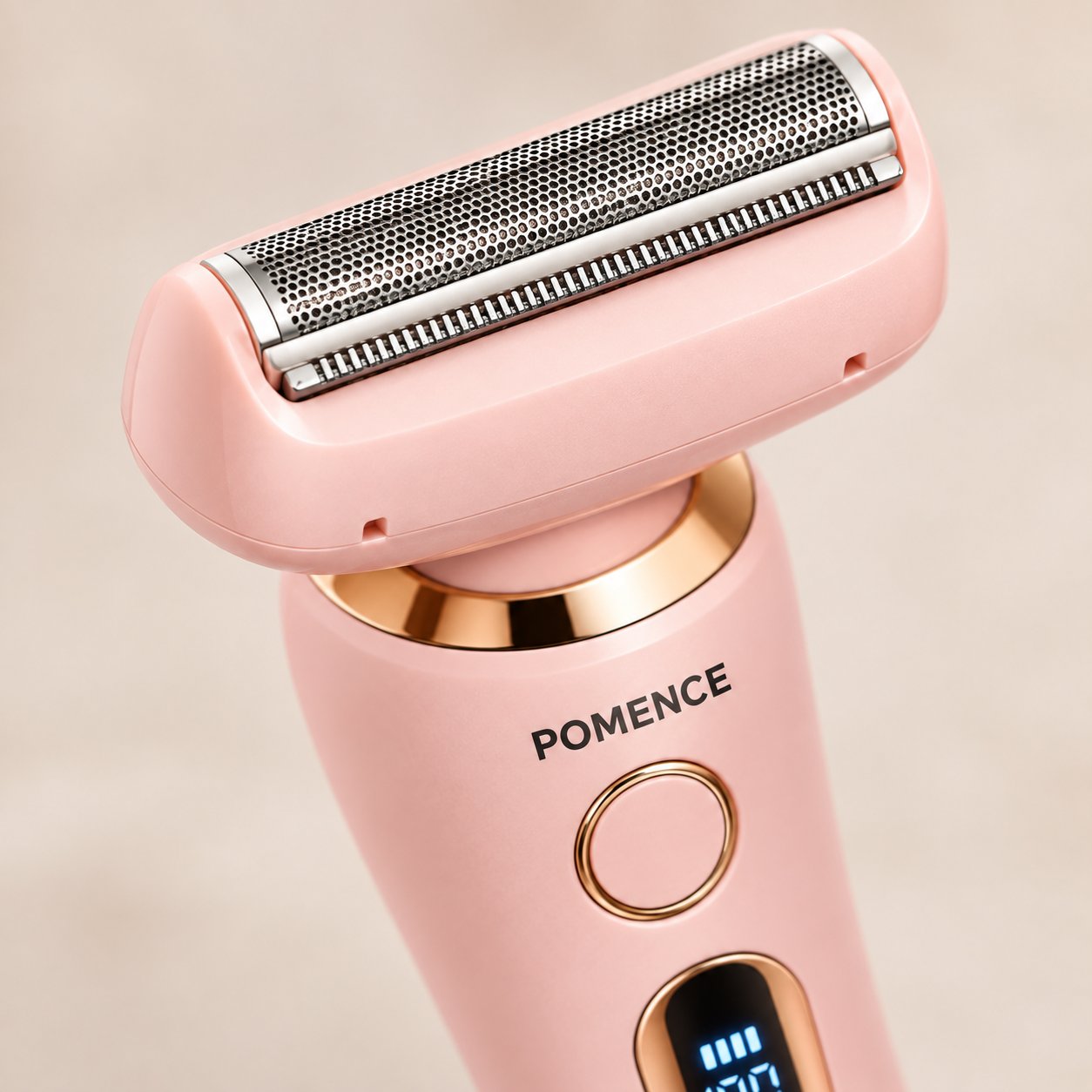 Macro of the precision trimmer blades beside the foil head of the Pomence shaver