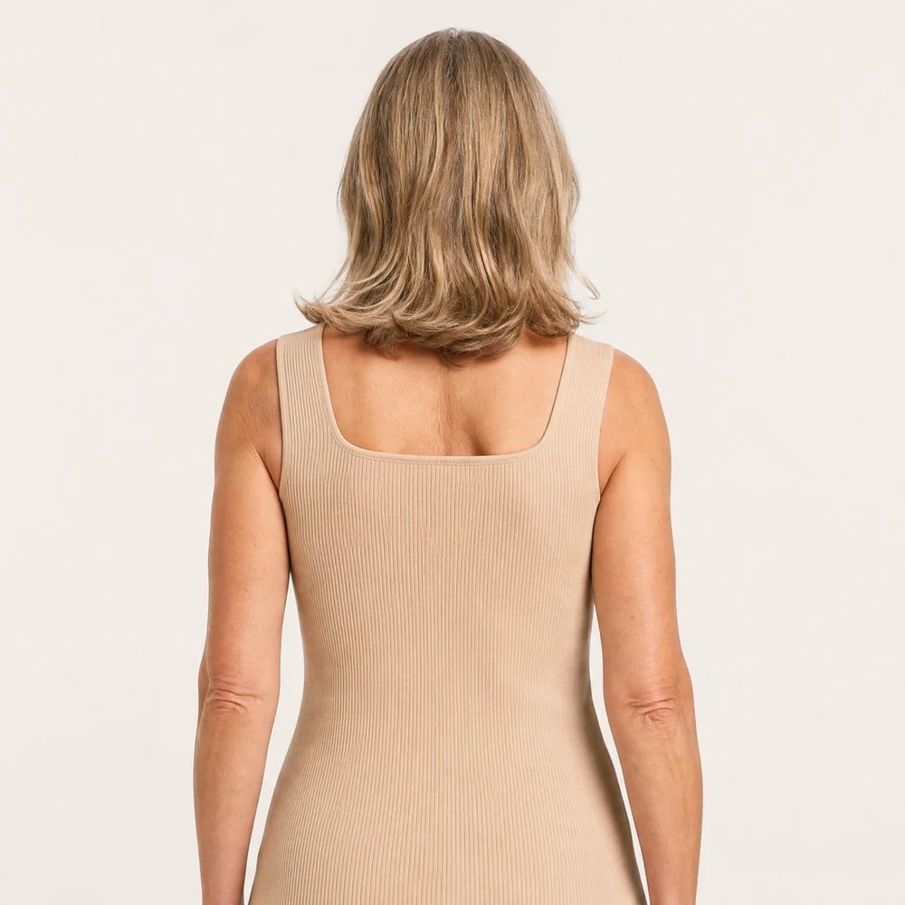 Back view of the Pomence Front-Support Bra Tank in Beige with a smooth back and no band