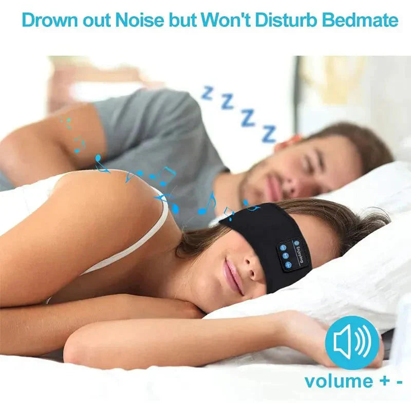 Couple asleep, one wearing the Bluetooth Sleep Headband without disturbing the other