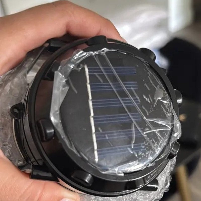 The solar panel on top of the lantern