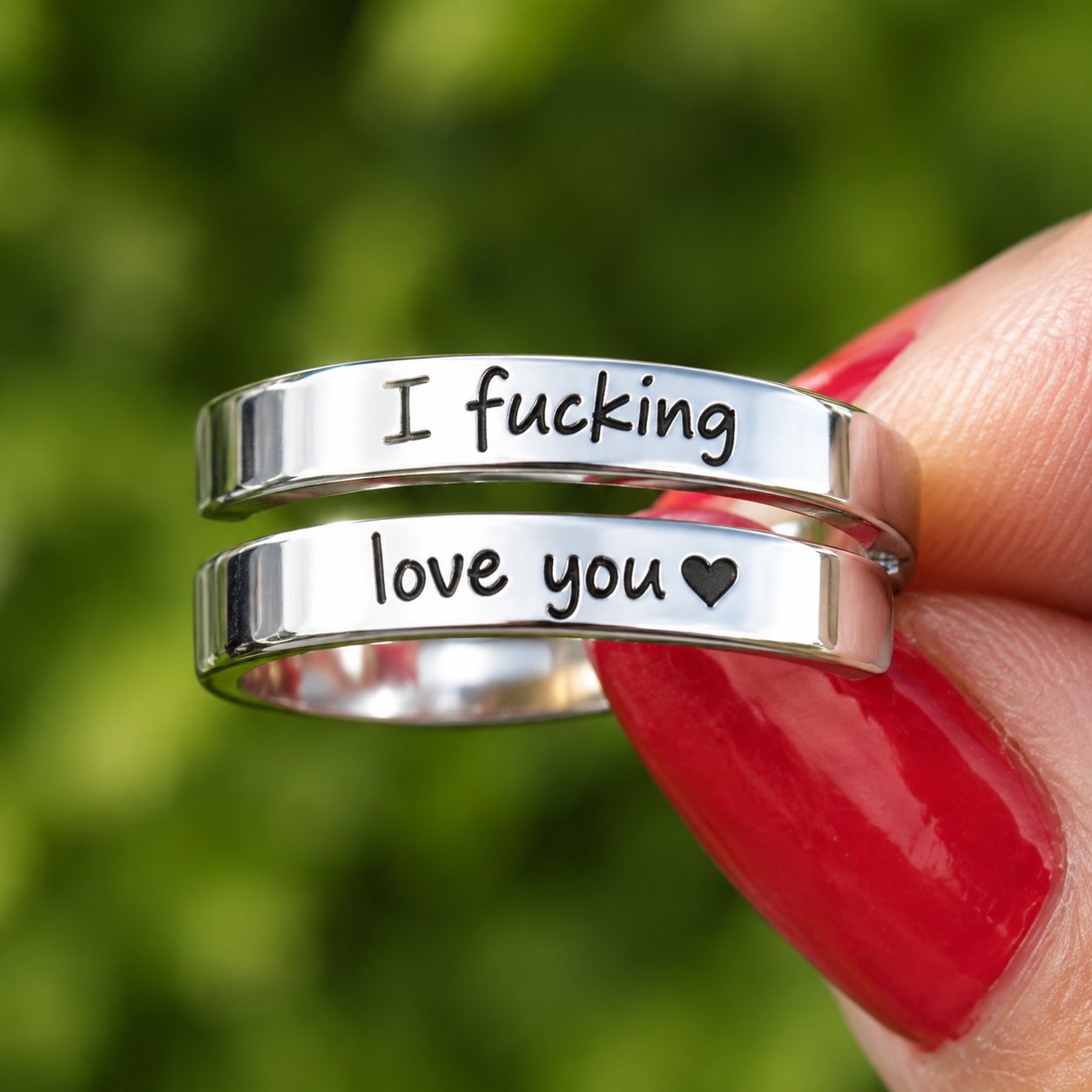 The open wrap form of the Pomence I F♡cking Love You Ring seen from the side