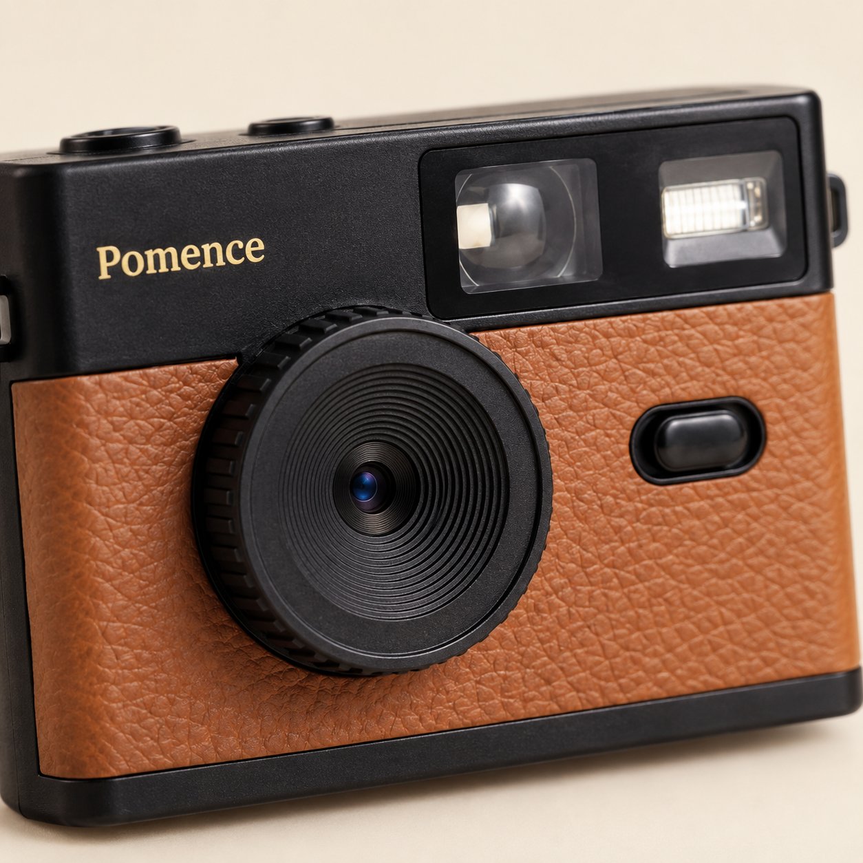 Close-up of the round lens barrel and its ridged ring on the Pomence Mini Retro Camera