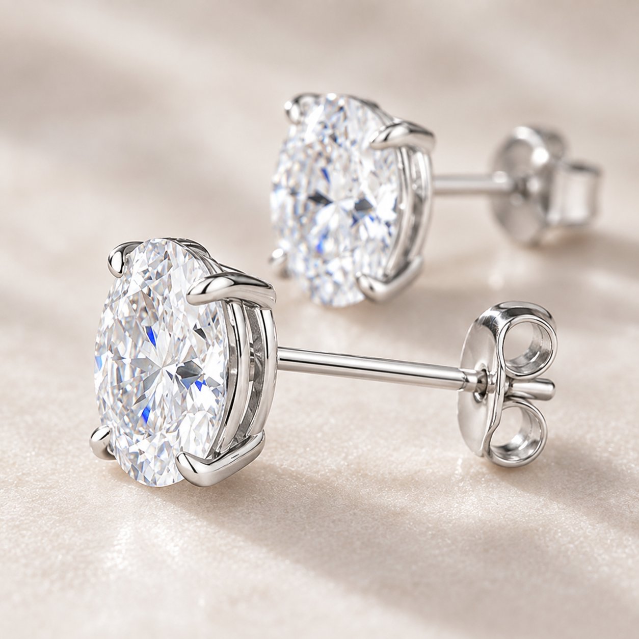 Macro of the faceted crown of a colorless synthetic moissanite stone catching cool white and blue light