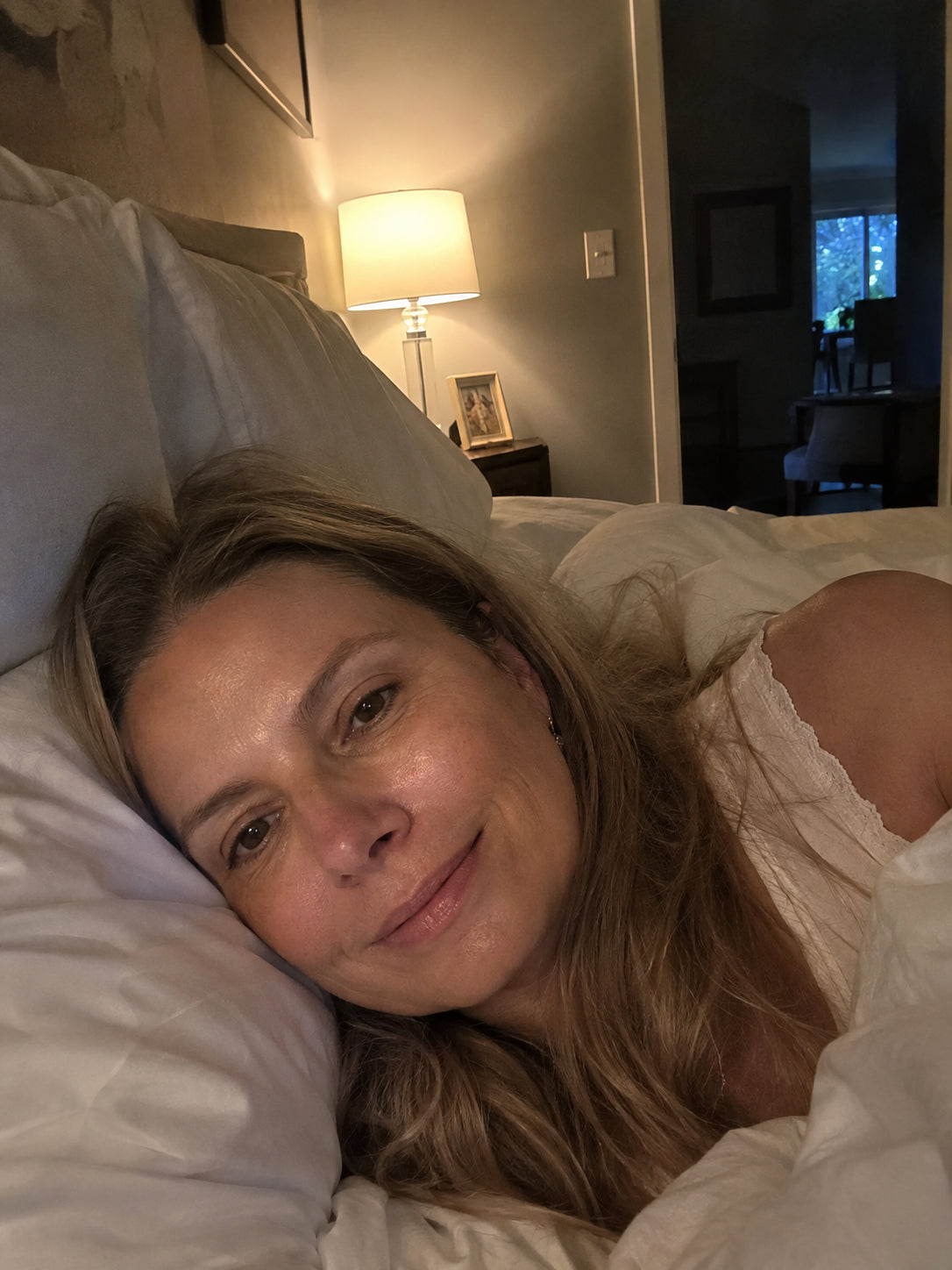 Woman resting calmly at home at night