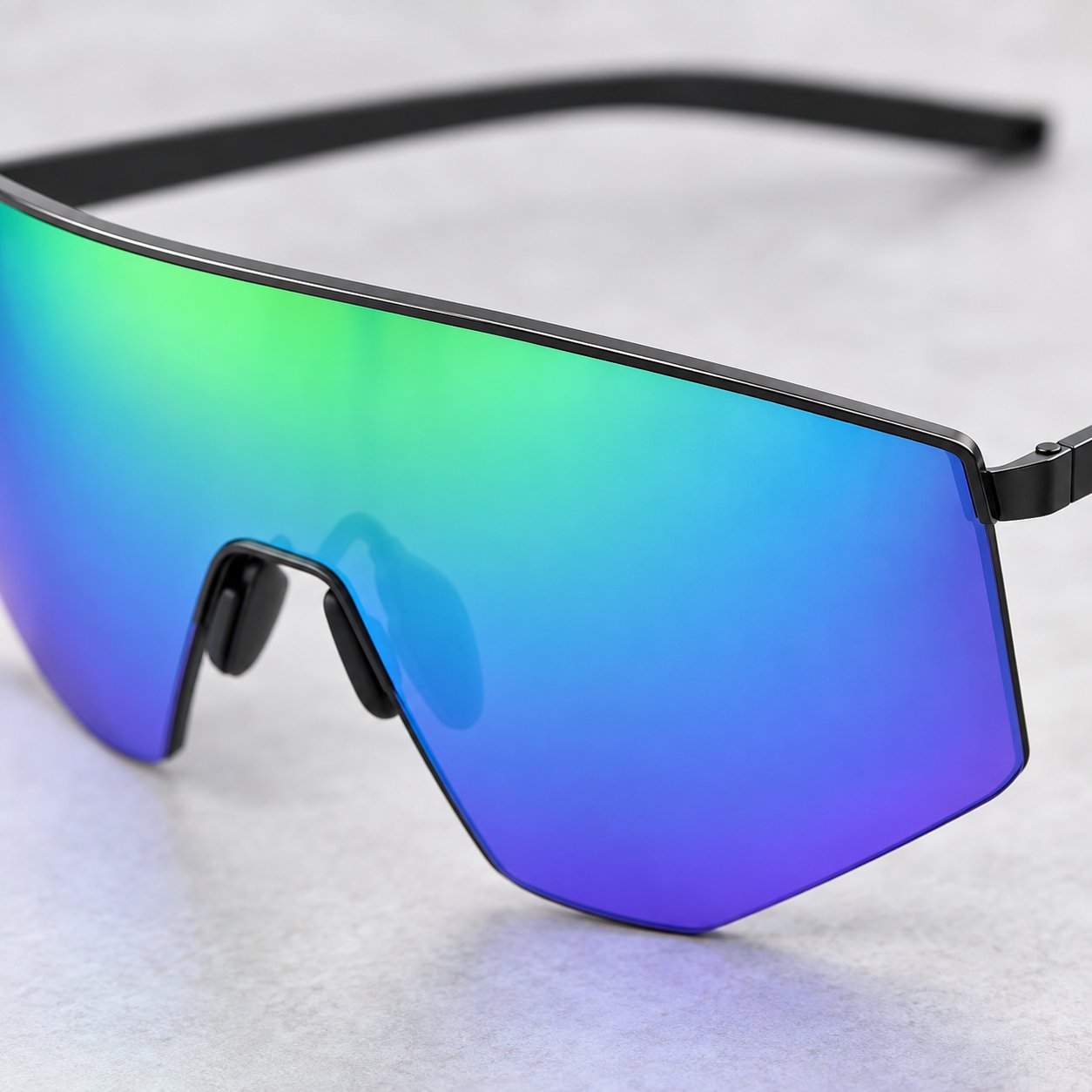 Macro of the thin black brow rail on the Pomence™ Photochromic Sport Sunglasses