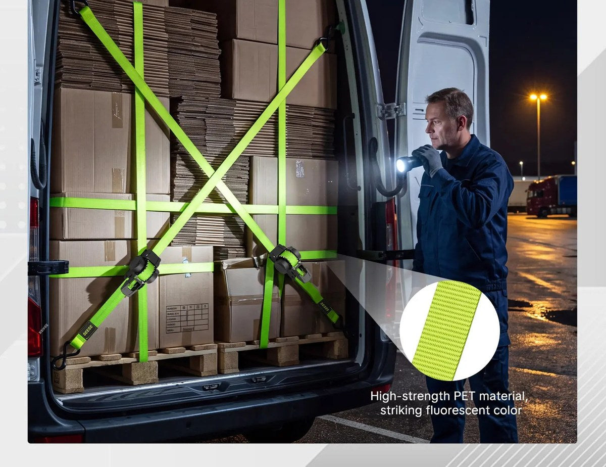 A van loaded with pallets held in place by hi vis retractable ratchet straps at night