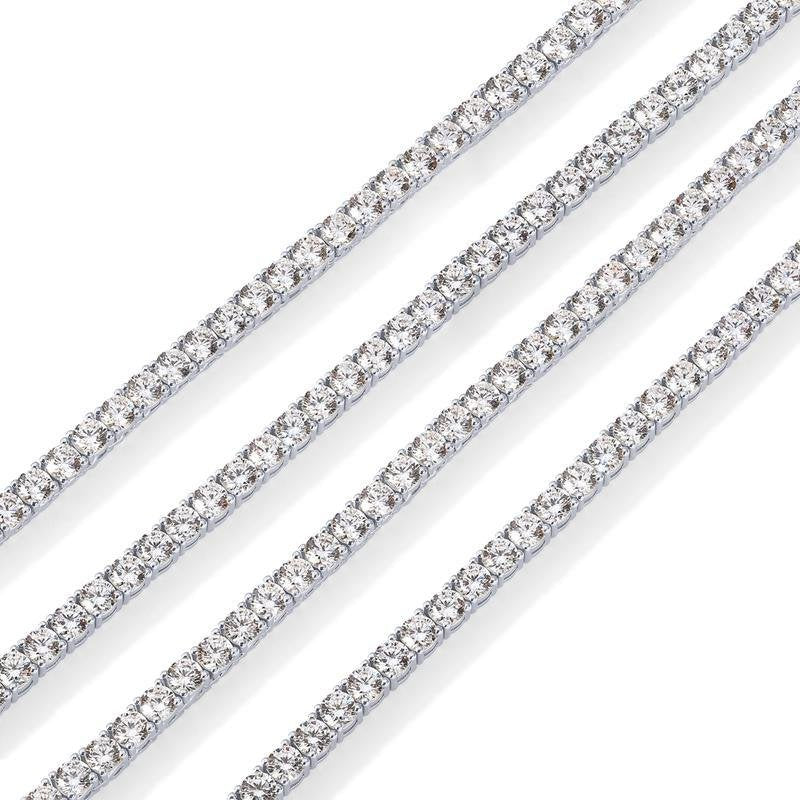 The silver tone Pomence Tennis Necklace, the continuous row of 2mm round cubic zirconia stones edge to edge