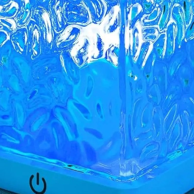 Close view of the ripple texture cut into the crystal cube