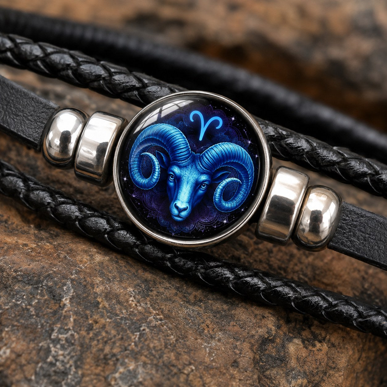 The three braided black leather strands and the two polished silver-tone barrel beads of the Pomence Zodiac Leather Bracelet