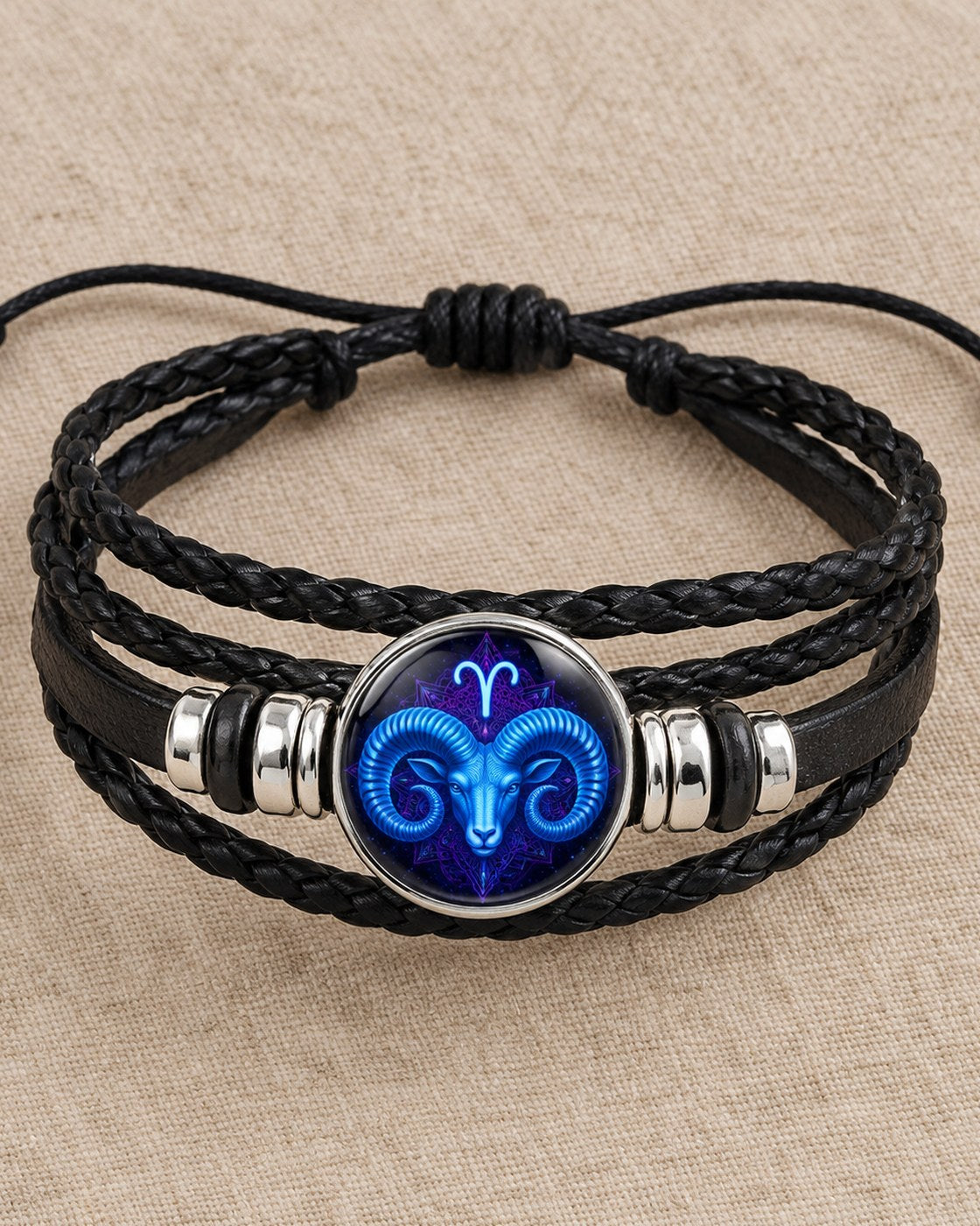The Pomence Zodiac Leather Bracelet laid flat, showing the black waxed sliding-knot closure and its two loose tails